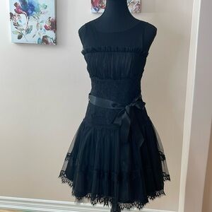 Absolutely gorgeous black fluffy dress, very feminine